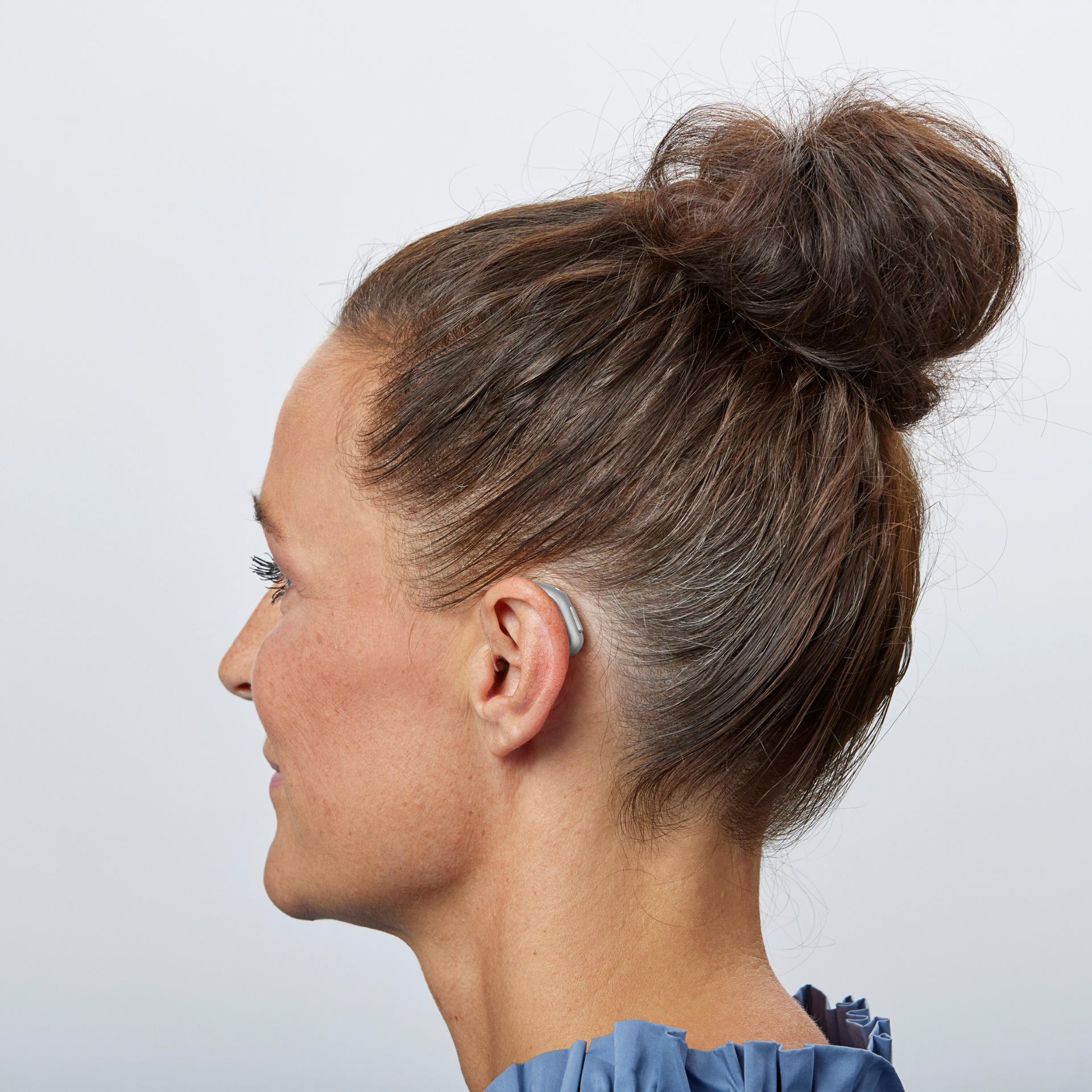 Oticon_reveal_woman_ear